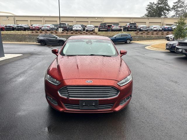 used 2014 Ford Fusion car, priced at $6,000