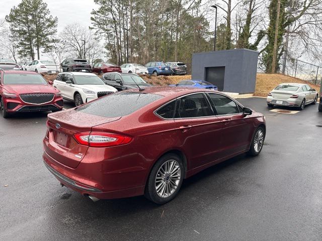 used 2014 Ford Fusion car, priced at $6,000