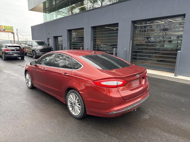 used 2014 Ford Fusion car, priced at $6,000