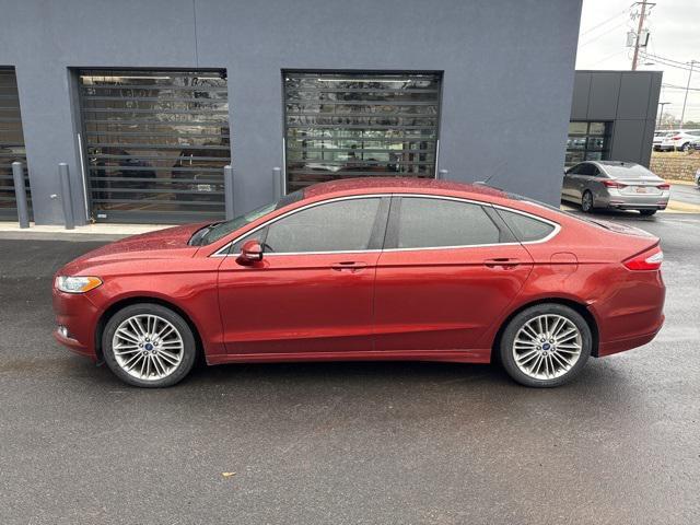 used 2014 Ford Fusion car, priced at $6,000