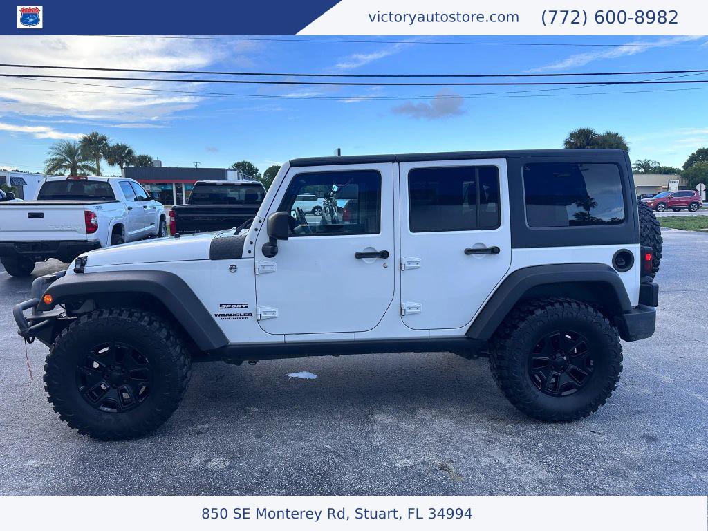 used 2014 Jeep Wrangler Unlimited car, priced at $12,500