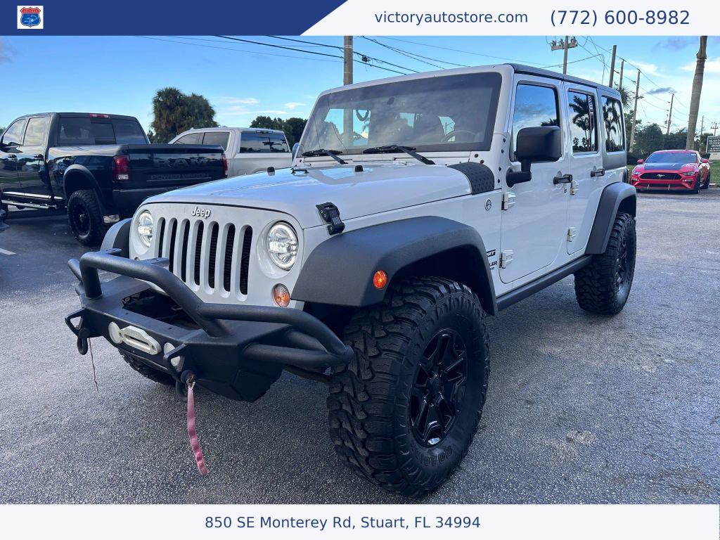 used 2014 Jeep Wrangler Unlimited car, priced at $12,500