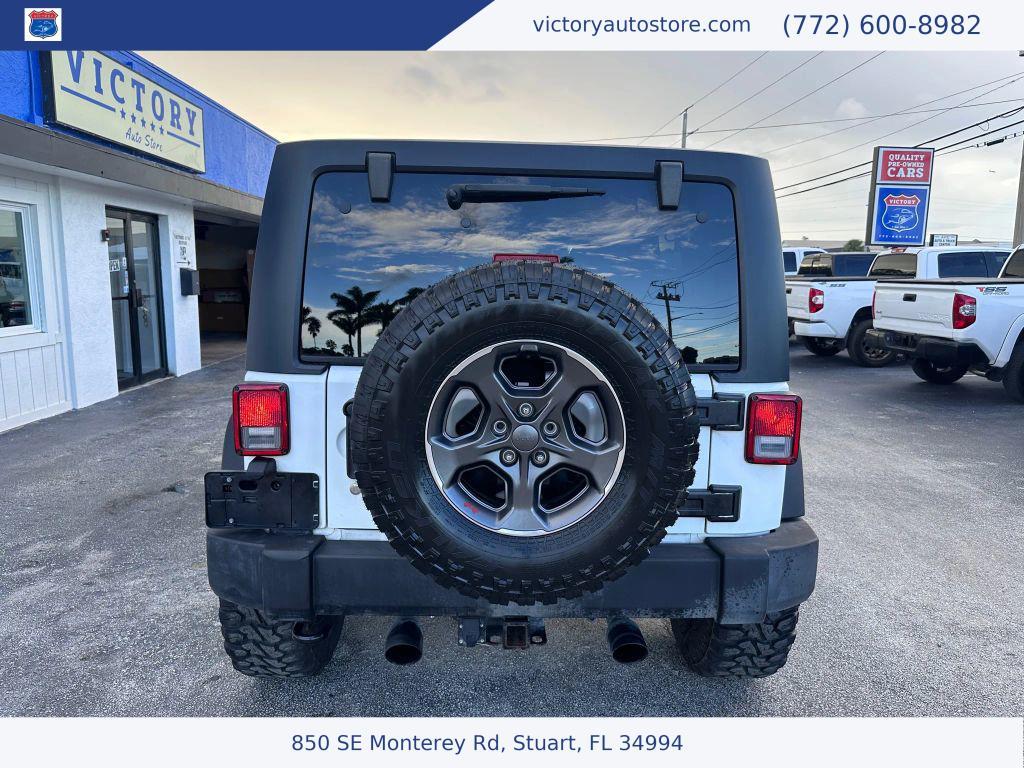 used 2014 Jeep Wrangler Unlimited car, priced at $12,500