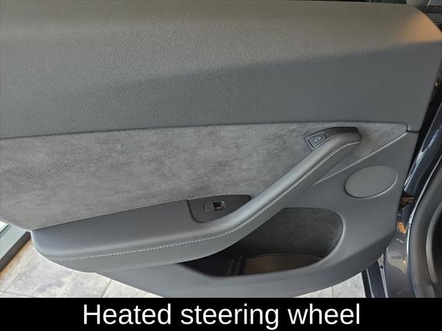 used 2024 Tesla Model Y car, priced at $34,305
