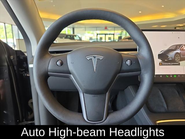 used 2024 Tesla Model Y car, priced at $34,305