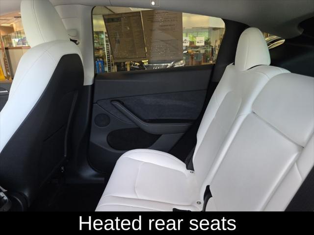 used 2024 Tesla Model Y car, priced at $34,305