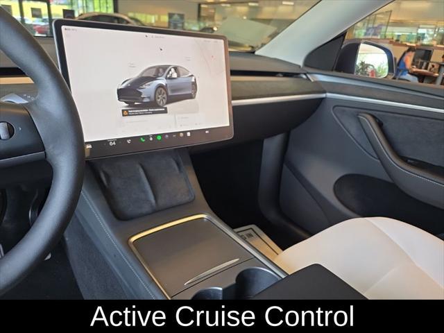used 2024 Tesla Model Y car, priced at $34,305