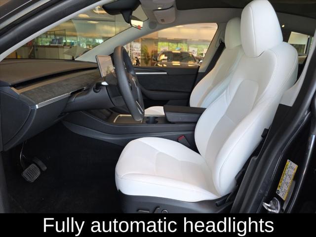 used 2024 Tesla Model Y car, priced at $34,305