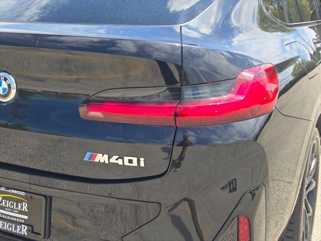 used 2022 BMW X4 car, priced at $38,808