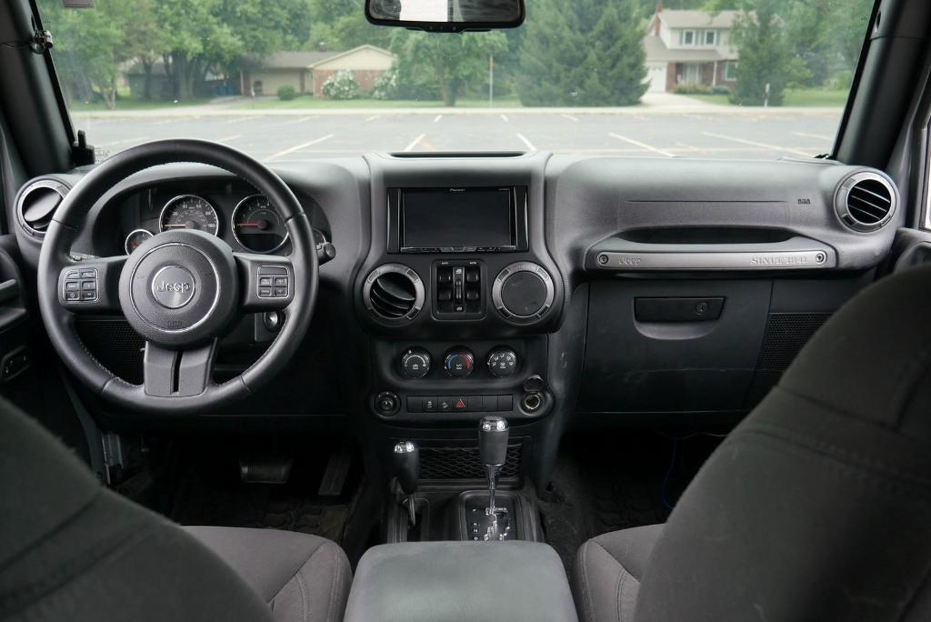 used 2016 Jeep Wrangler Unlimited car, priced at $22,167