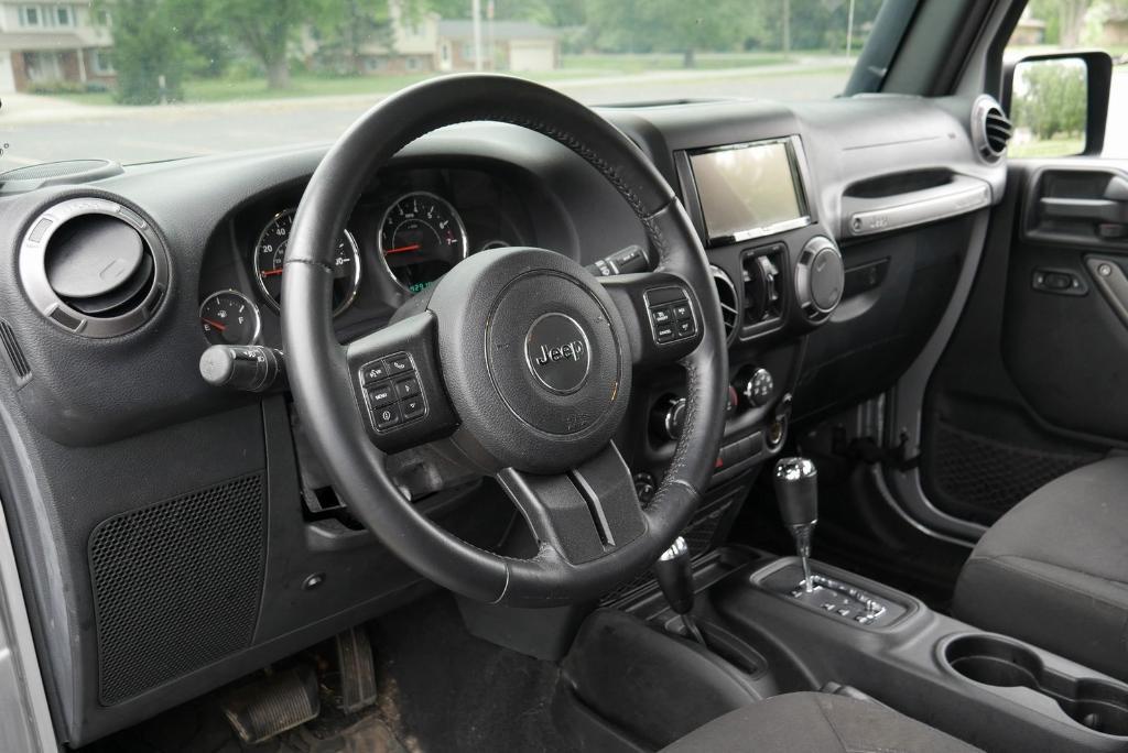 used 2016 Jeep Wrangler Unlimited car, priced at $22,167