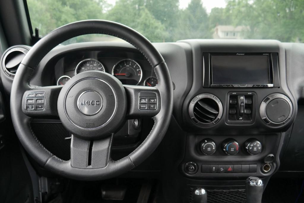 used 2016 Jeep Wrangler Unlimited car, priced at $22,167