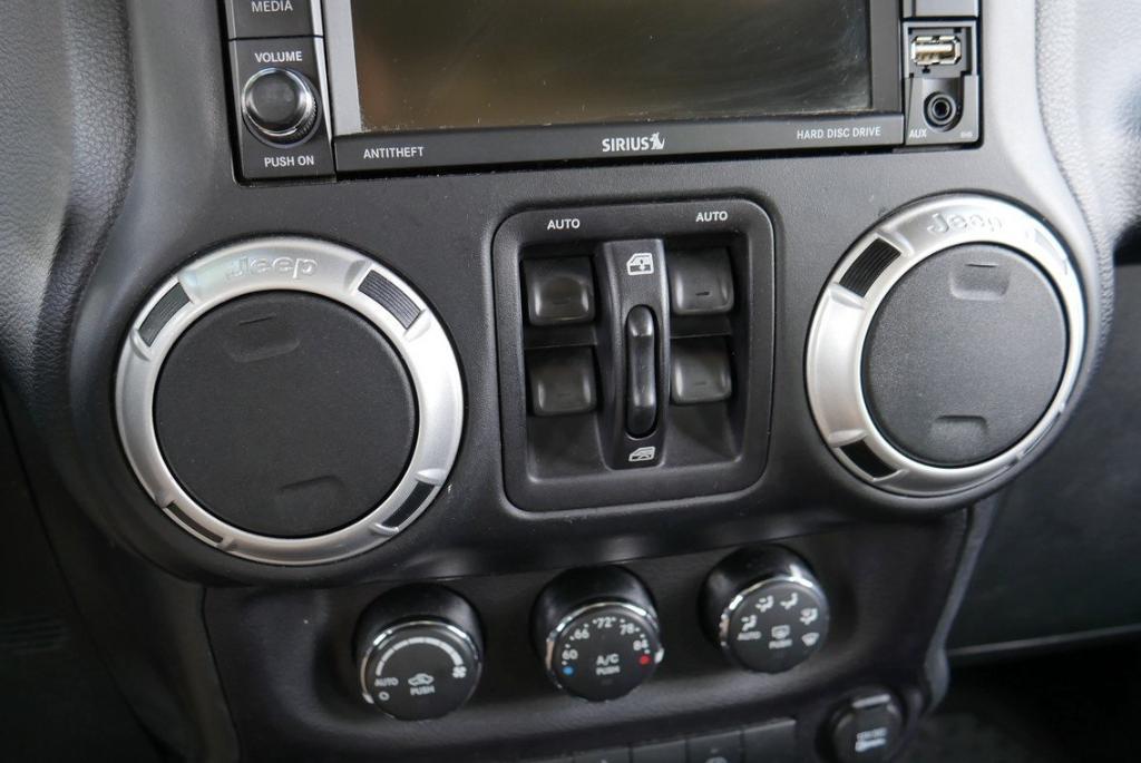 used 2016 Jeep Wrangler Unlimited car, priced at $16,021