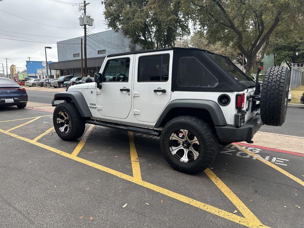 used 2013 Jeep Wrangler Unlimited car, priced at $19,900