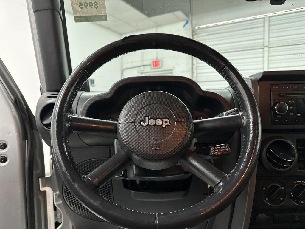 used 2009 Jeep Wrangler Unlimited car, priced at $12,900