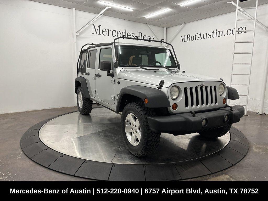 used 2009 Jeep Wrangler Unlimited car, priced at $12,900