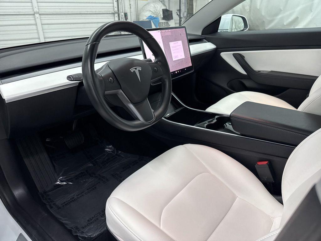 used 2019 Tesla Model 3 car, priced at $15,500