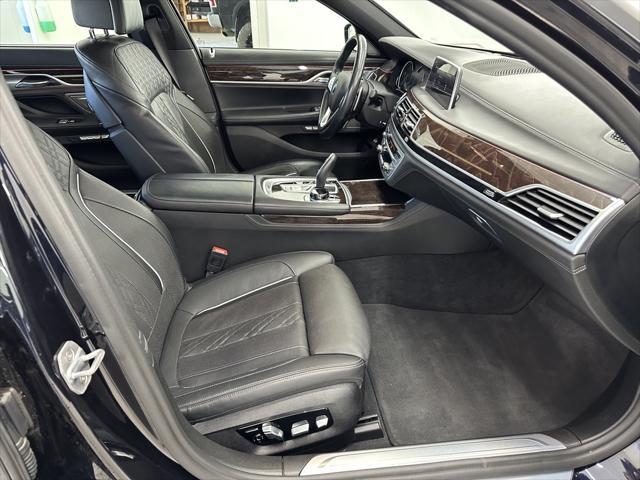 used 2018 BMW 750 car, priced at $30,873