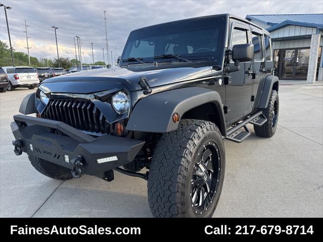 used 2010 Jeep Wrangler Unlimited car, priced at $18,999