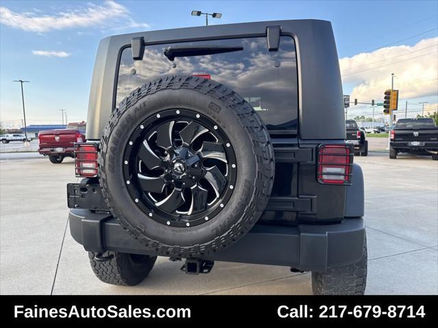 used 2010 Jeep Wrangler Unlimited car, priced at $18,999