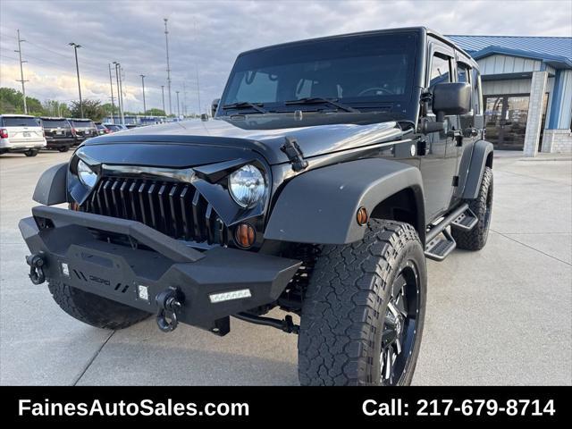 used 2010 Jeep Wrangler Unlimited car, priced at $18,999