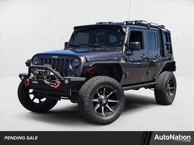 used 2014 Jeep Wrangler Unlimited car, priced at $19,660