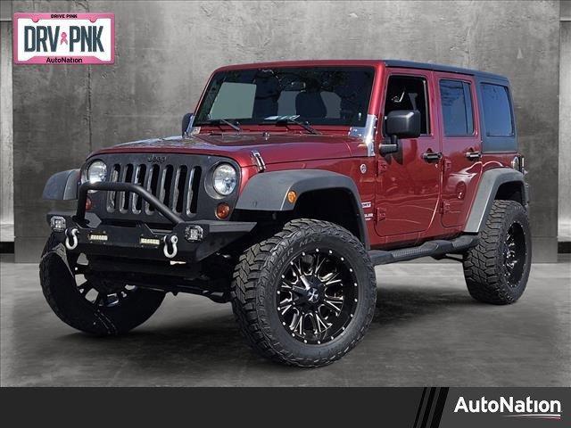 used 2011 Jeep Wrangler Unlimited car, priced at $16,918