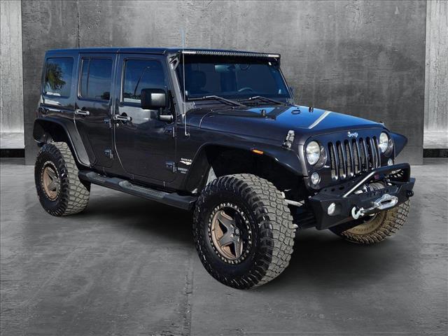 used 2014 Jeep Wrangler Unlimited car, priced at $18,120