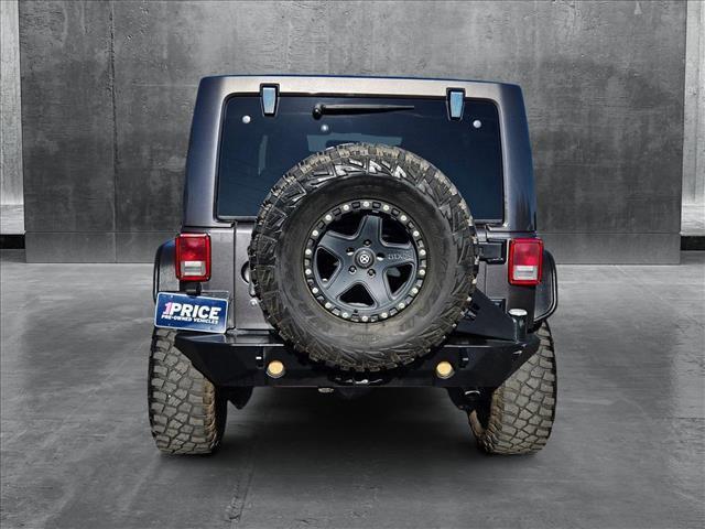 used 2014 Jeep Wrangler Unlimited car, priced at $18,120