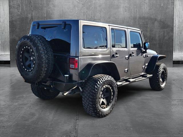 used 2014 Jeep Wrangler Unlimited car, priced at $18,120