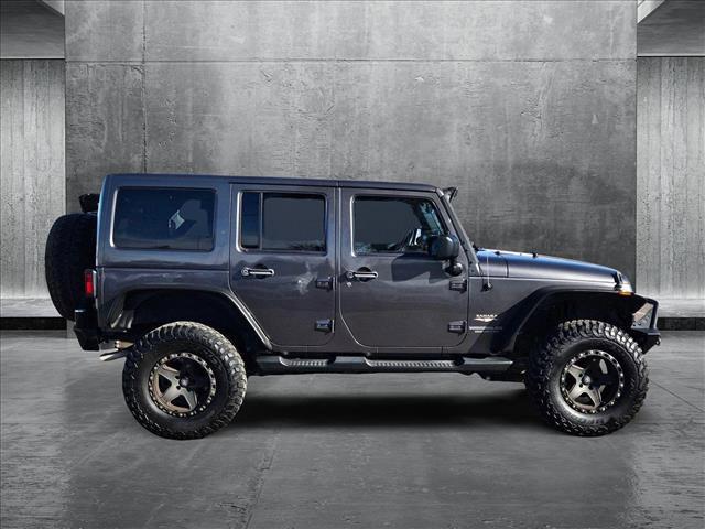 used 2014 Jeep Wrangler Unlimited car, priced at $18,120