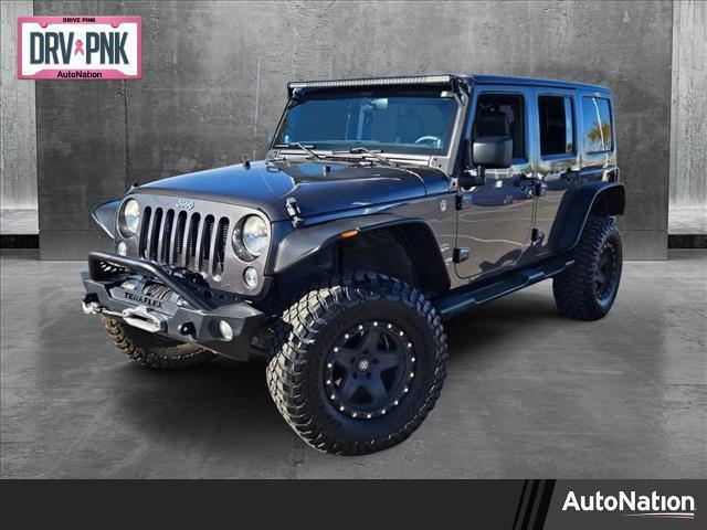 used 2014 Jeep Wrangler Unlimited car, priced at $18,120