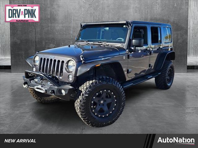 used 2014 Jeep Wrangler Unlimited car, priced at $18,120