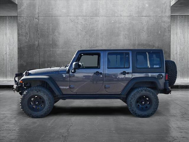 used 2014 Jeep Wrangler Unlimited car, priced at $17,991