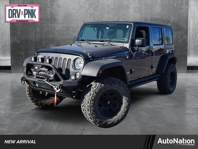 used 2014 Jeep Wrangler Unlimited car, priced at $17,991