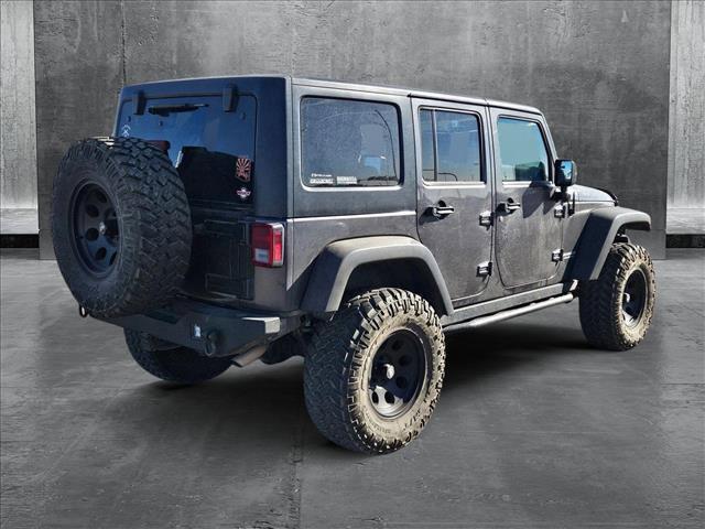 used 2014 Jeep Wrangler Unlimited car, priced at $17,991