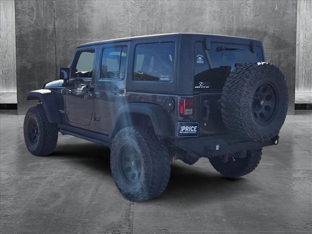 used 2014 Jeep Wrangler Unlimited car, priced at $17,991