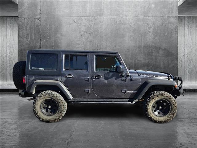 used 2014 Jeep Wrangler Unlimited car, priced at $17,991