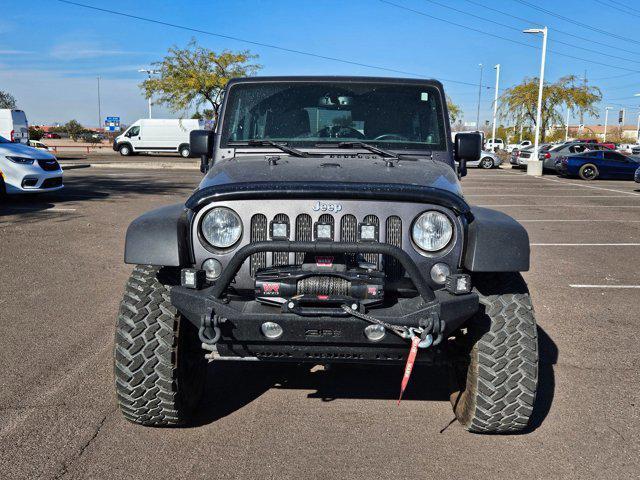 used 2014 Jeep Wrangler Unlimited car, priced at $17,991