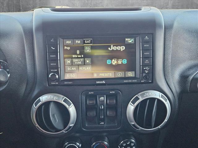 used 2015 Jeep Wrangler Unlimited car, priced at $15,991