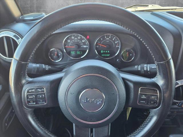 used 2015 Jeep Wrangler Unlimited car, priced at $15,991