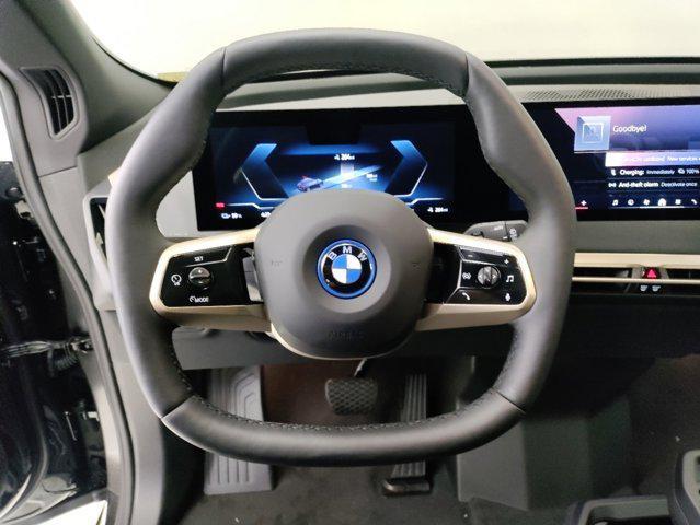 new 2025 BMW iX car, priced at $97,275