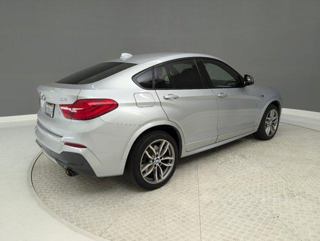 used 2018 BMW X4 car, priced at $27,977