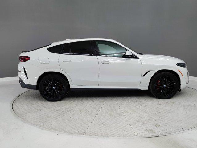 new 2025 BMW X6 car, priced at $81,925