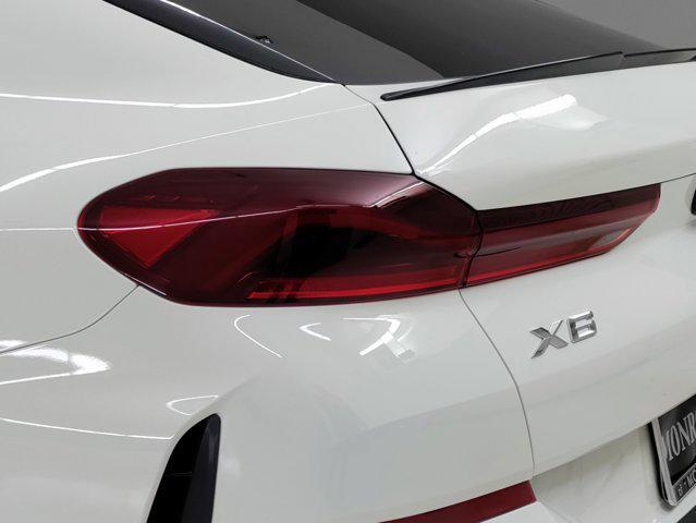 new 2025 BMW X6 car, priced at $81,925