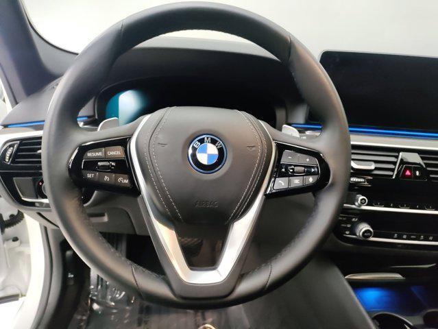 used 2023 BMW 530e car, priced at $33,497