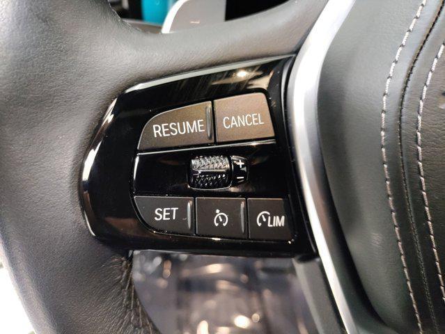 used 2023 BMW 530e car, priced at $33,497