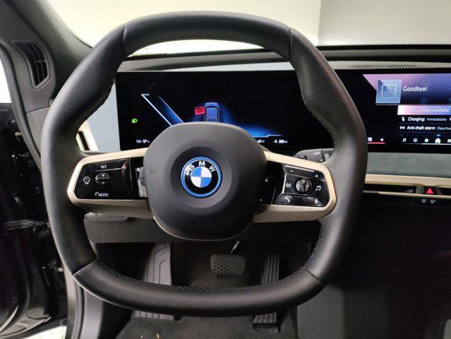 new 2025 BMW iX car, priced at $94,595