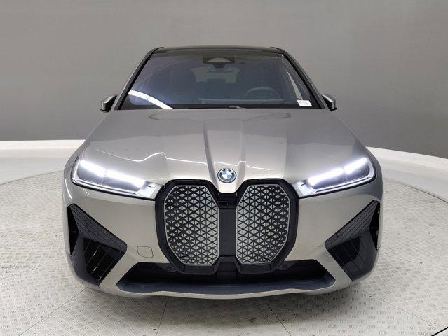 new 2025 BMW iX car, priced at $93,385