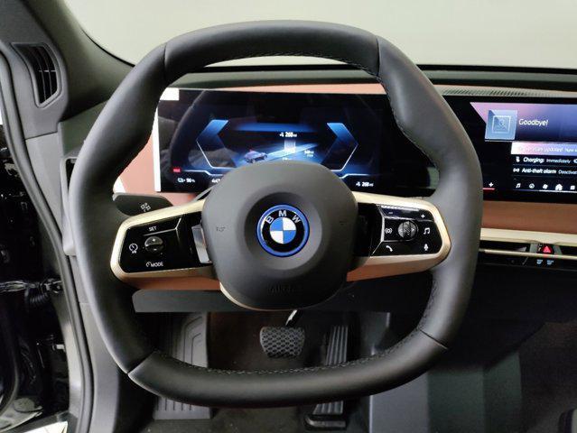 new 2025 BMW iX car, priced at $98,075